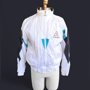 VINTAGE 80s/90s Le Coq Sportif white, black, and teal windbreaker jacket men’s M